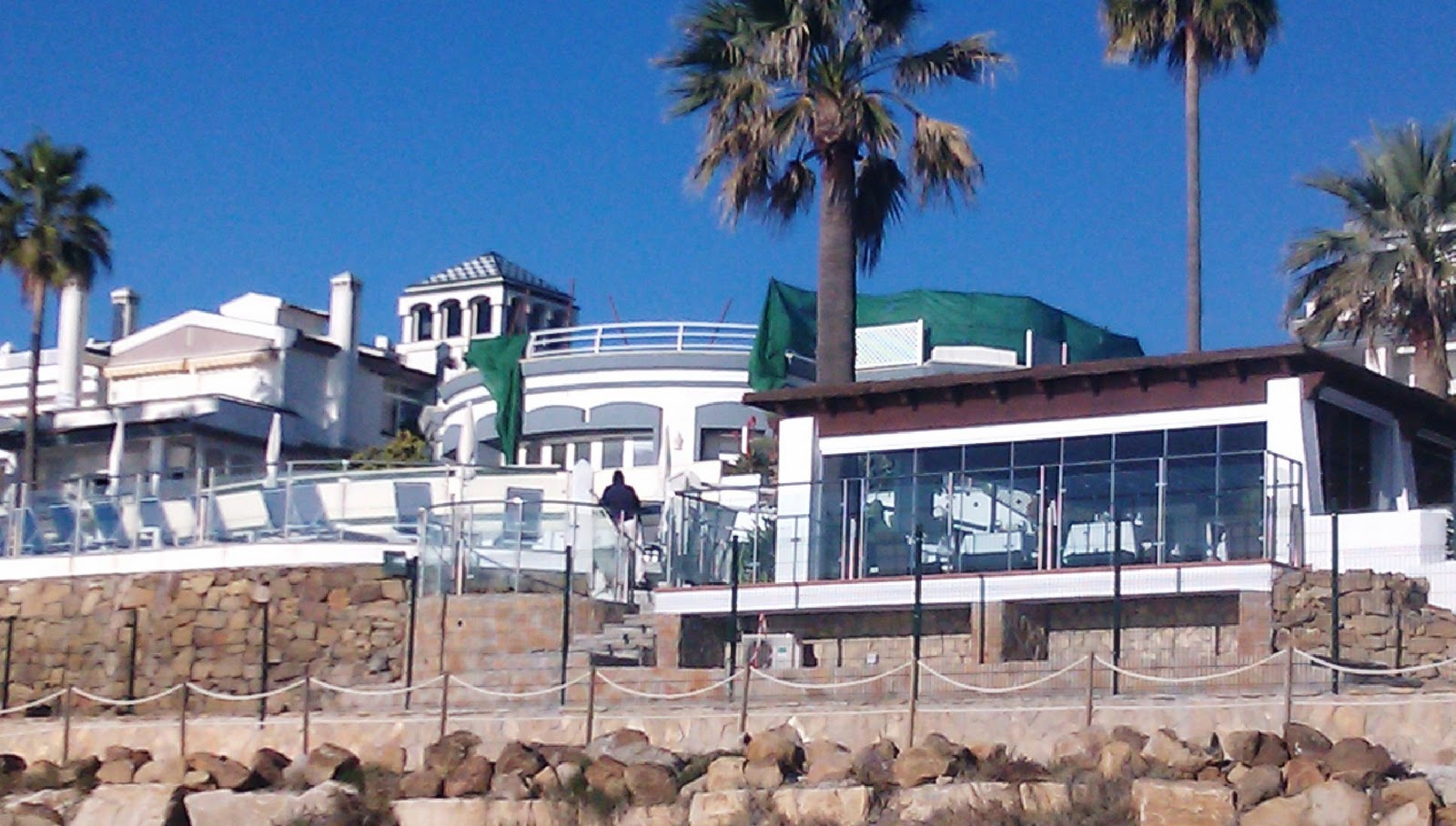 HomeCare Estepona View of Dominion Beach restaurant and beach pool