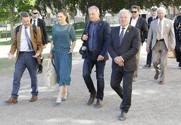 Crown Princess Victora wore Baum und Pferdgarten Milena Top and Selda Skirt. Princess Victoria wore BY MALENE BIRGER pupms and carried Tote Bag