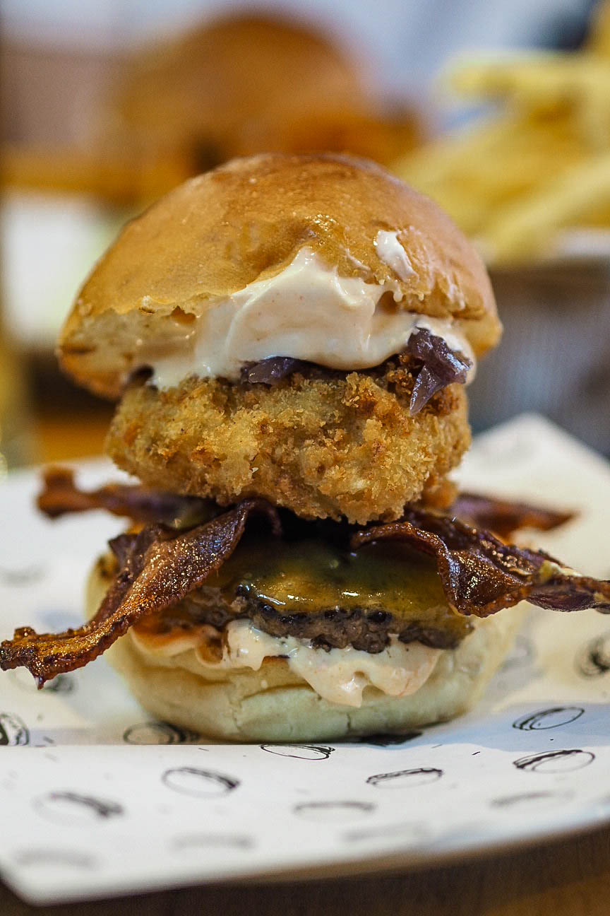 Burger with bacon, potato rosti and spicy mayonnaise