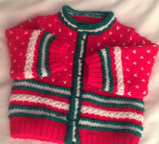 https://www.ravelry.com/patterns/library/christmas-snow-time-baby-cardigan
