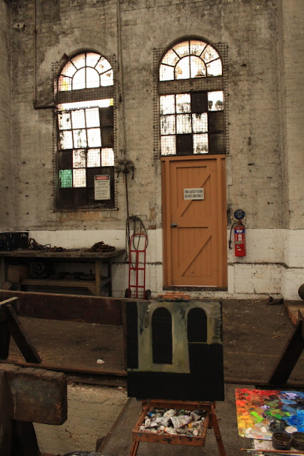 plein air oil painting of windows in the Large Erecting Shop in the Eveleigh Railway Workshops by industrial heritage artist Jane Bennett plein air oil painting of windows in the Large Erecting Shop in the Eveleigh Railway Workshops by industrial heritage artist Jane Bennett