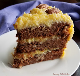 The German Chocolate Cake has all of the coconut and chocolate goodness you'd expect. It is a show stopper perfect for a party!