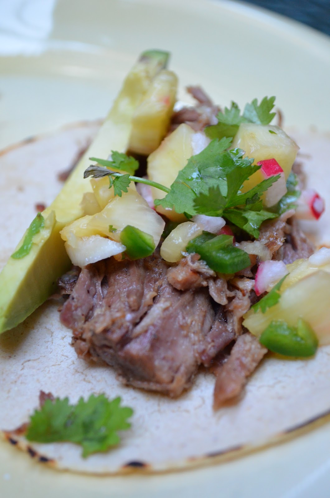 amour fou(d) tacos with carnitas and pineapple salsa.