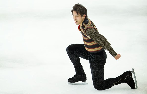 Takahito Mura (JPN) udfører sit lange program ved Four Continents Championships 2014