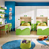 غرفة نوم أطفال مكونة من سريرين ودولاب مجموعة فى شكل واحد