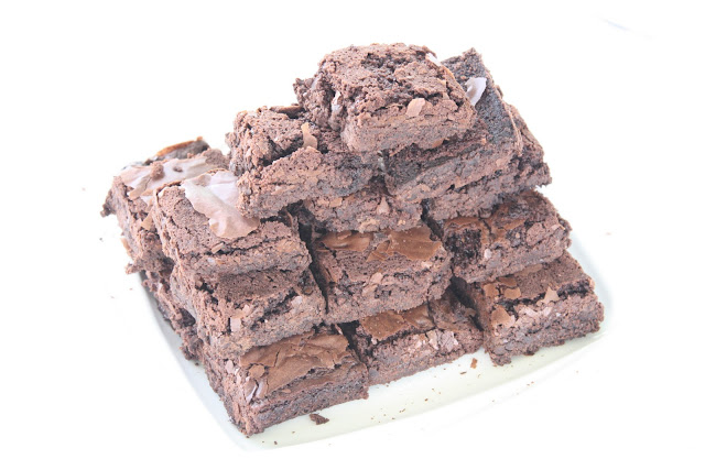 A stack of chocolate brownies.