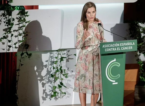 Queen Letizia wore Zara printed dress, Coolook Jewelry Sila earrings and carried Adolfo Dominguez clutch