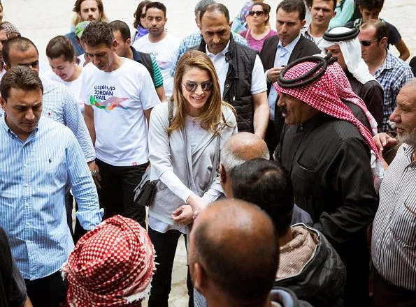 Queen Rania wore Valentino Virgin wool and silk dress for gave an interview with The Sunday Times Magazine. visit Dana Nature Reserve with Thru Hike