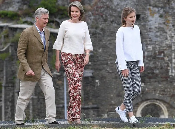 Queen Mathilde wore Dries Van Noten trousers, white bell Sleeve Stretch Crepe Top. Crown Princess Elisabeth and Princess Eleonore