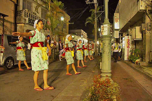 young women dancing in the street