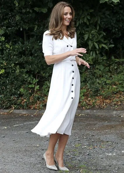 Kate Middleton wore Suzannah flippy wiggle dress and Boden Viola maxi shirt dress. Tabitha Simmons silver pumps. Adidas shoe