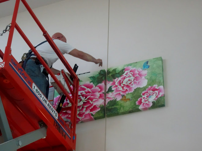 Hanging my painting in St Joseph hospital in Nashua