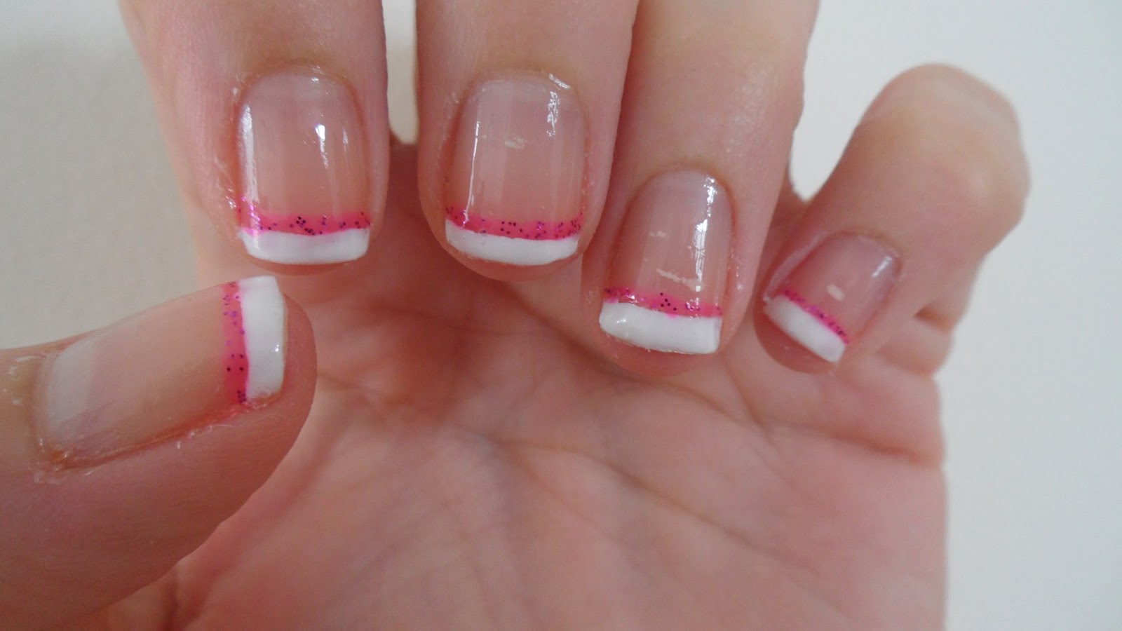 4. "Consider a classic French manicure for a timeless and polished look" - wide 3