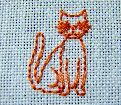 The orange kitty from "All Things Bright and Beautiful."  (c) Erin E. Turowski, 2012.
