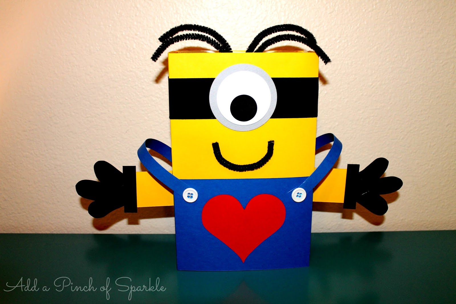 Add A Pinch Of Sparkle Minion Valentine Bo We Started Out With An Empty Box And Covered It In Yellow Blue Black Cardstock Added Some Arms Hands Overall Straps