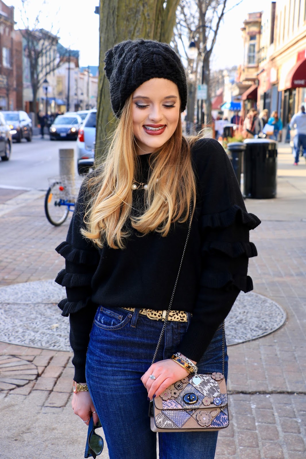 Nyc fashion blogger Kathleen Harper wearing a ruffle sleeve sweater from Anthropologie