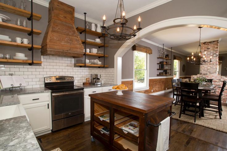 Asia Evans Artistry The Fixer Upper Phenomenon With Joanna Gaines White Tile Backsplash Rustic Wood Hood Kitchen Makeover Open Concept Shelves Photo Credit Hgtv Fixer Upper