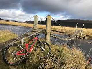bike in bridge with hill in background