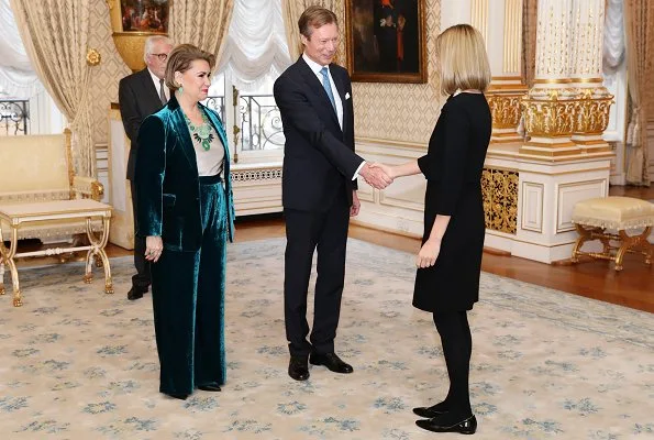 Grand Duke Henri and Grand Duchess Maria Teresa. Maria Teresa is wore greenvelvet suit. Princess Stephanie