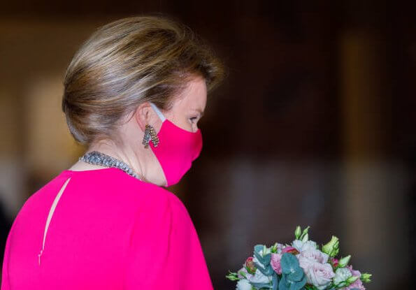 King Philippe, Queen Mathilde, Prince Laurent, Princess Astrid and Prince Lorenz attended a concert. Natan red gown, Armani
