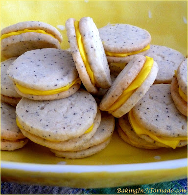 Lemon Filled Poppy Shortbread Cookies, a melt in your mouth sandwich cookie bursting with flavor | Recipe developed by www.BakingInATornado.com | #recipe #lemon #cookies