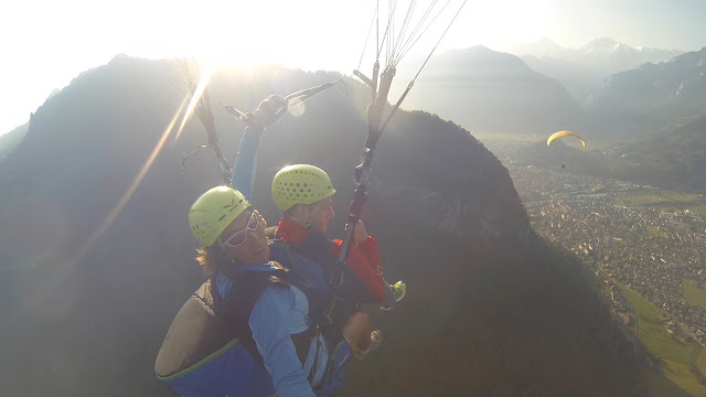 Paragliding 4000ft over the immense Swiss Alps in the home of adventure: Interlaken, Paragliding in Switzerland, How much does it cost to Paraglide, Is Paragliding safe, paraglide in Interlaken, adventure holiday, best place for adventure trip, geneve, Bern, The Alps, Alpine, skydive, fly, freedom, extreme sports, mountain, hike,