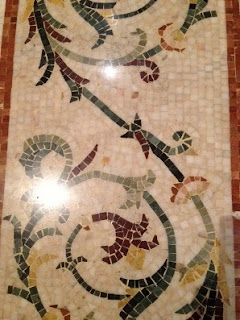 Intricate mosaic designs flow throughout the Bellagio's lobby and reception areas.