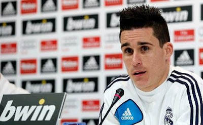 Jose Callejon at press conference with Real Madrid jersey