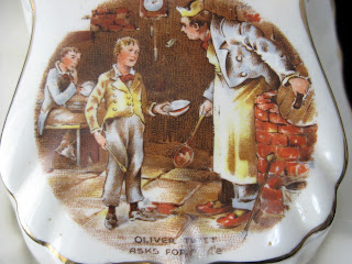 https://timewasantiques.net/products/dickens-ware-oliver-twist-butter-dish-cheese-dome-2-piece-1920s-lancaster?_pos=5&_sid=91cc17960&_ss=r