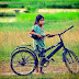 ຕອນກຳລັງຖ່າຍຮູບຢູ່ນາງນ້ຽຜູ້ນີ້້ຈູງລົດຖີບຜ່ານກ້ອງ ເລີຍຈັດເປັນແບບເລີຍສາ - Little Girl With Bicycles