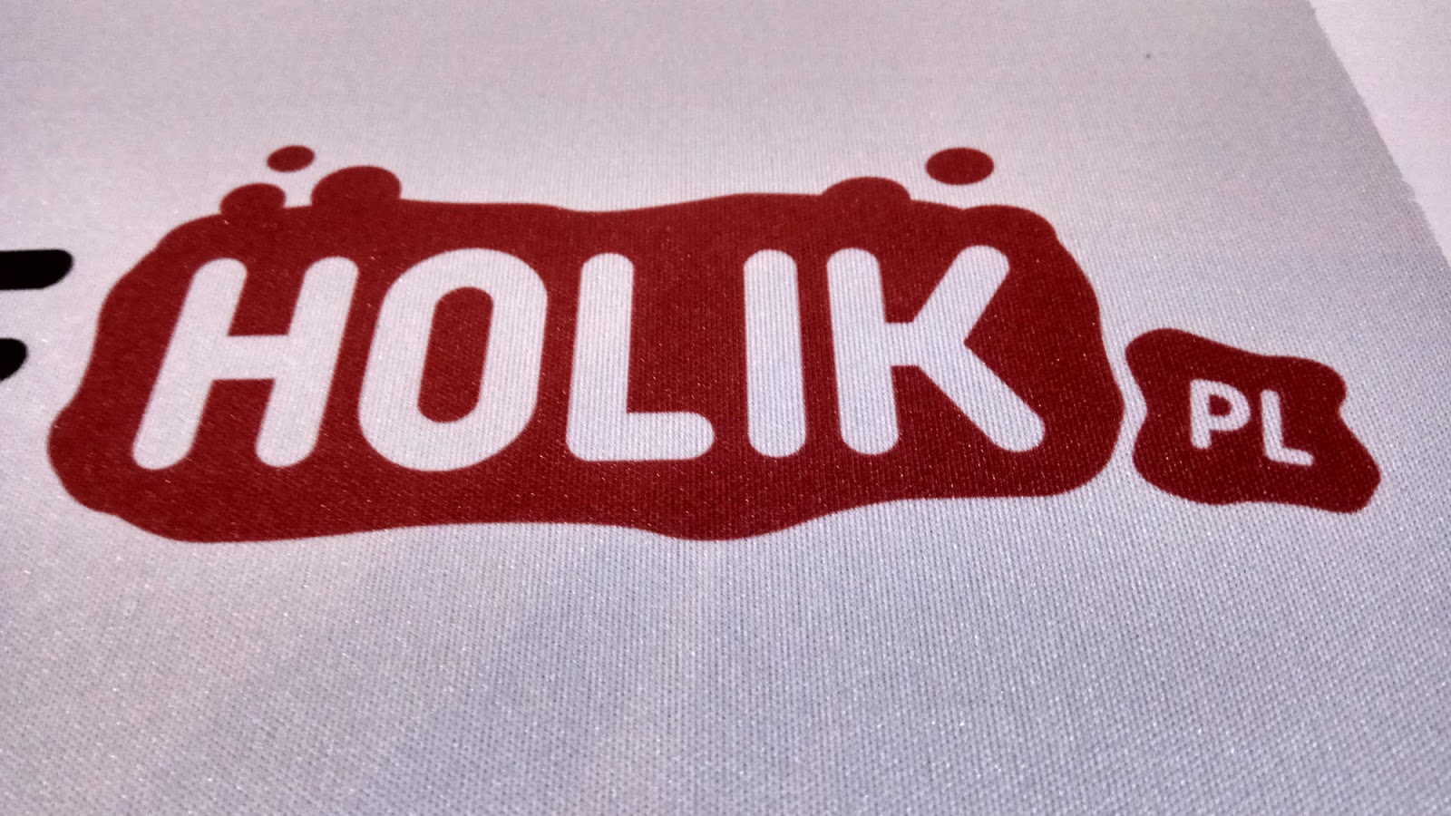 Przybliżenie podkładki pod myszkę z nadrukiem Holik