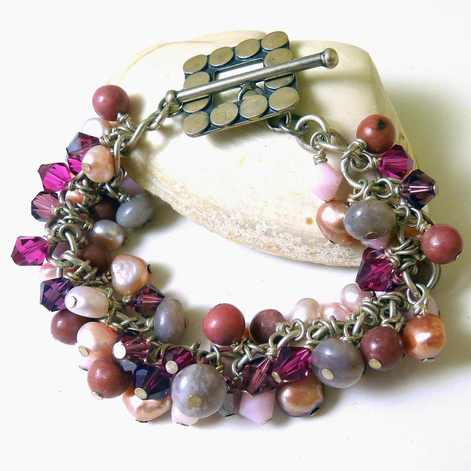 http://www.shazzabethcreations.co.nz/#!product/prd1/2442531711/pink-gemstone-charm-bracelet