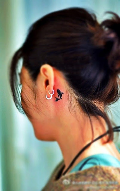 Tatuagens de peixes para as mulheres Tatuagens de peixes para as mulheres