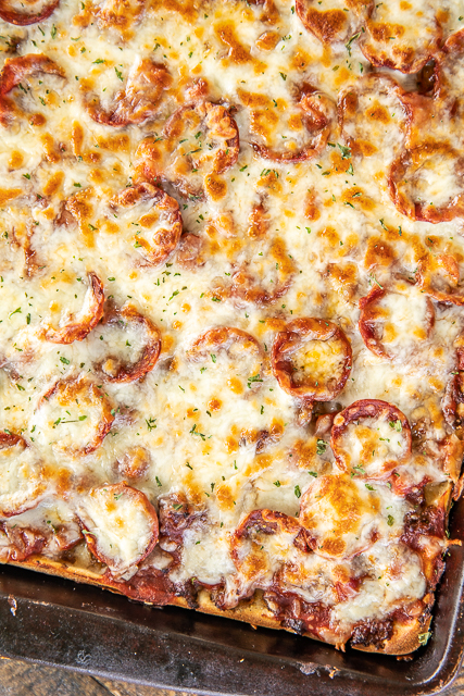 Crazy Crust Pizza - our new favorite pizza!! No rolling out dough - the crust is made from a liquid batter. Top the pizza with your favorite toppings. Flour, salt, Italian seasoning, eggs, milk, pepperoni, sausage, ham, pizza sauce and mozzarella cheese. We LOVE this pizza! We've been making it once a week for the past month. It is our go-to recipe!! #pizza #casserole Crazy Crust Pizza - our new favorite pizza!! No rolling out dough - the crust is made from a liquid batter. Top the pizza with your favorite toppings. Flour, salt, Italian seasoning, eggs, milk, pepperoni, sausage, ham, pizza sauce and mozzarella cheese. We LOVE this pizza! We've been making it once a week for the past month. It is our go-to recipe!! #pizza #casserole