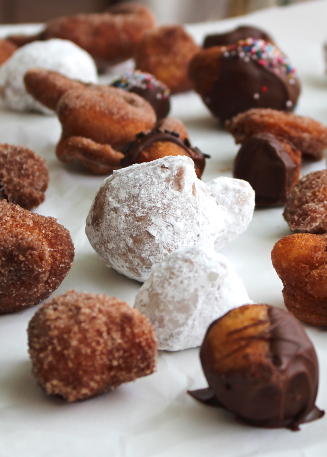 Homemade Drop Doughnuts are the perfect sweet treat for a weekend morning, made with a quick, one-bowl batter that is fried until puffed and golden brown.  Dress your doughnuts up with your favorite toppings like cinnamon sugar, powdered sugar, and chocolate!