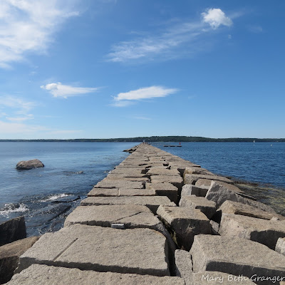 rocky walk to the Rockland Breakwater Lighthouse photo by mbgphoto