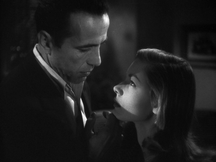 Humphrey Bogart as Harry Morgan and Lauren Bacall as Marie 'Slim'...