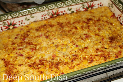 A classic corn casserole made with frozen and creamed corn, cracker crumbs, pimentos, eggs, milk and butter.