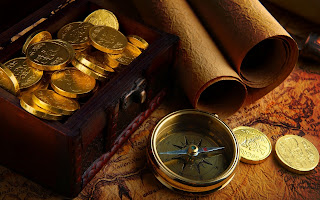 Kompas, landkaart en oude munten