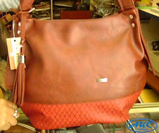 cartera hexagonal holms akc