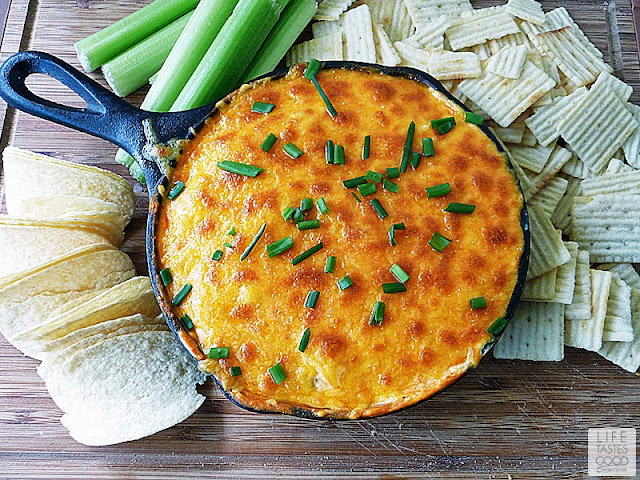 Buffalo Ranch Chicken Dip | by Life Tastes Good is a tangy, creamy dip that tastes like Buffalo Chicken Wings and ranch dressing all mixed into one delicious dip! This dip is super easy to make and a must for the Big Game! @Walmart #BigGameSnacks #ad