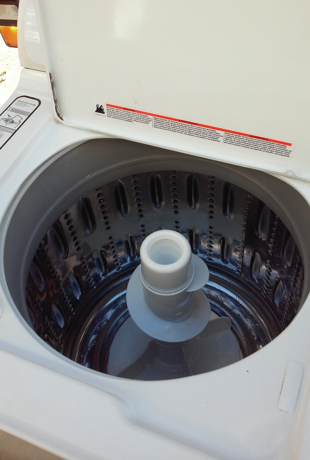 UHURU FURNITURE & COLLECTIBLES SOLD GE GHWN4250D Clothes Washer with