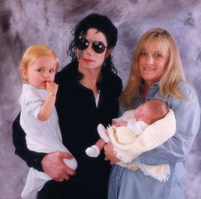 Paris Jackson with her Mom and Dad Michael Jackson.
