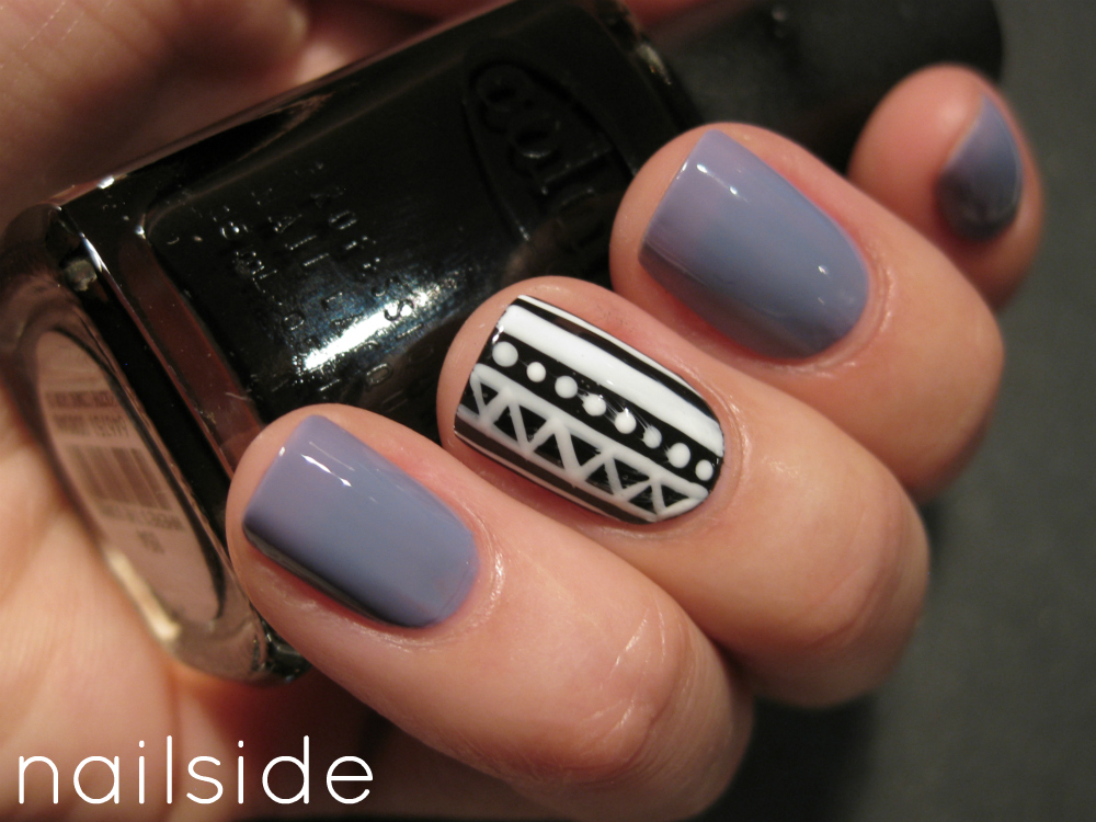 10. Blue and White Tribal Nail Design - wide 6