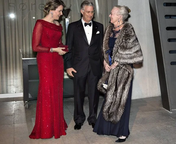 Queen Mathilde, Crown Princess mary, Princess Marie, Princess Elisabeth, Prince Joachim and Prince Frederik attend a dinner at the Black Diamond.Queen wore Armani red gown, Princess wore blue dress and red dress