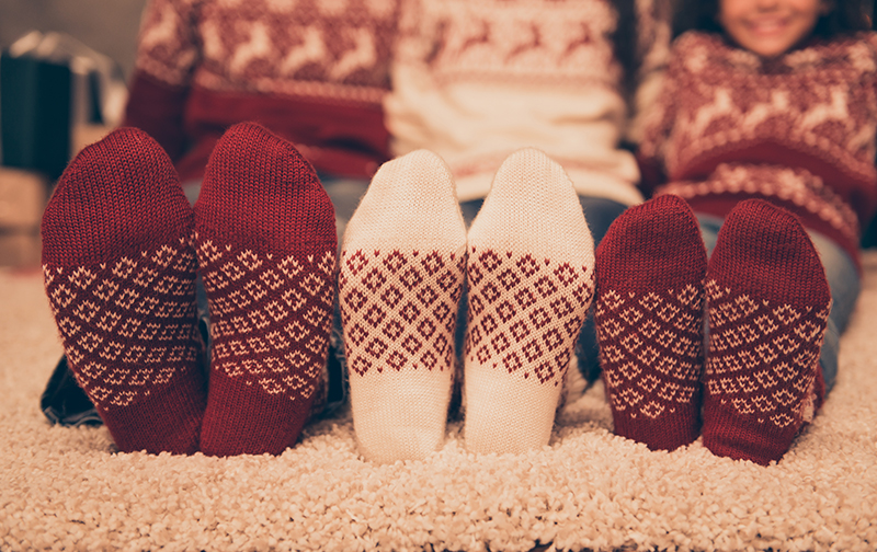family with christmas socks