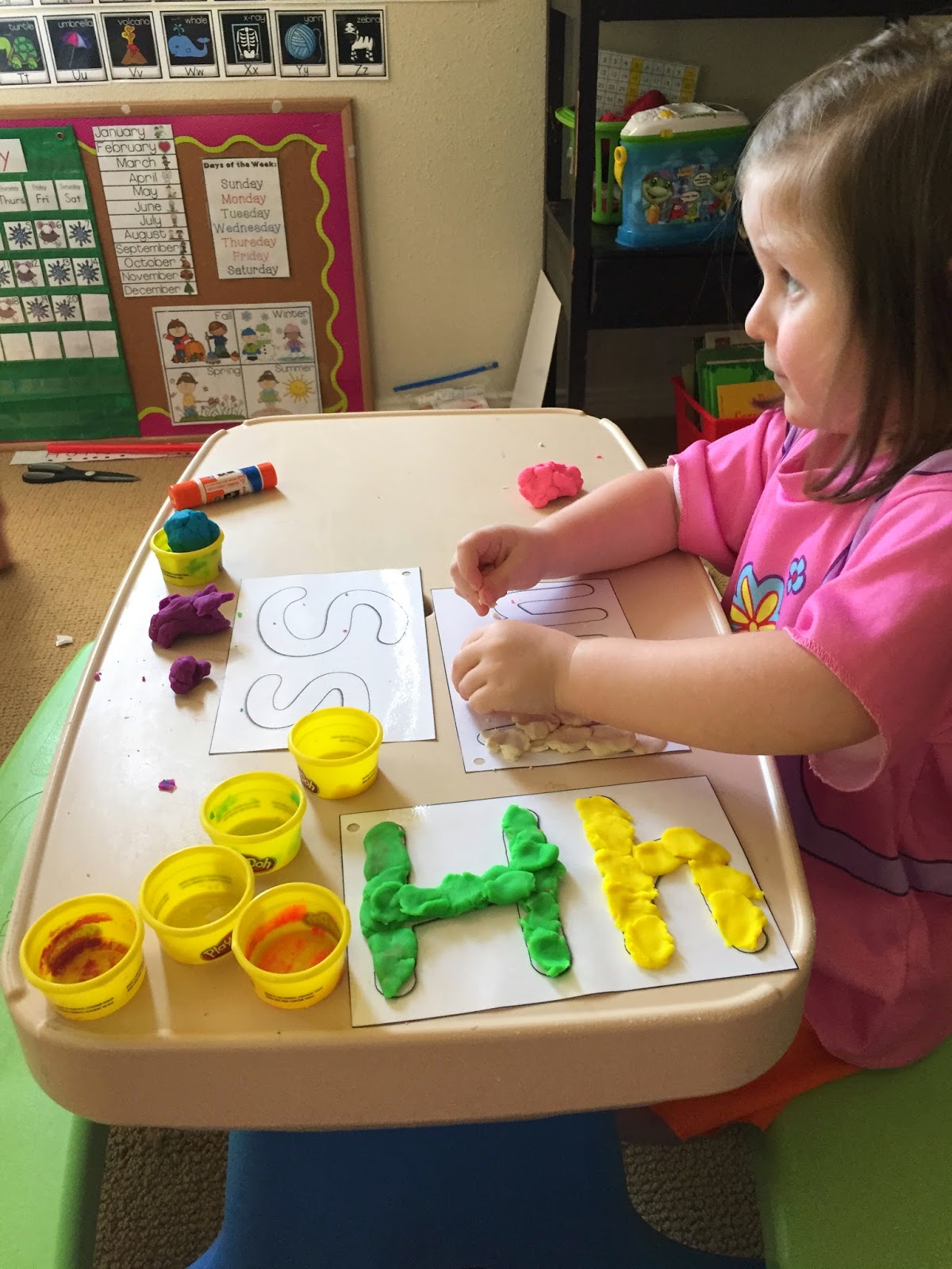 Giggles and Glue sticks....sisters learning together.