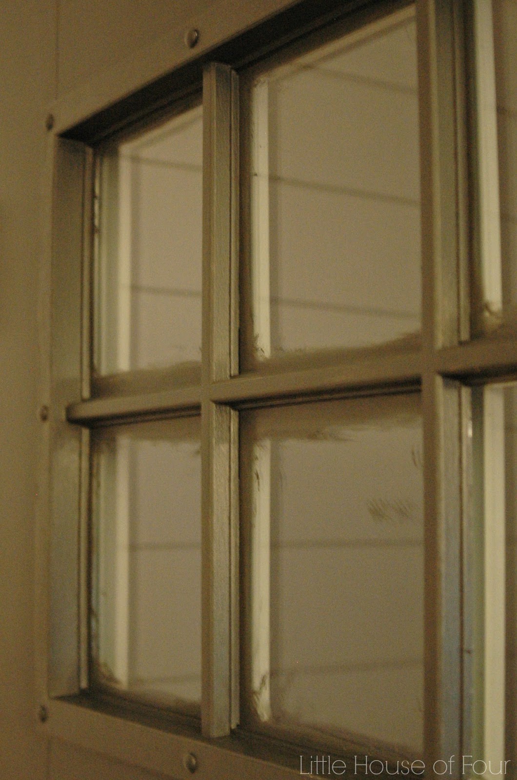 Updating the entryway with Sherwin Williams Iron Ore Little House of