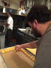 Jay Ducote portions out grits for one of the dishes at the James Beard House