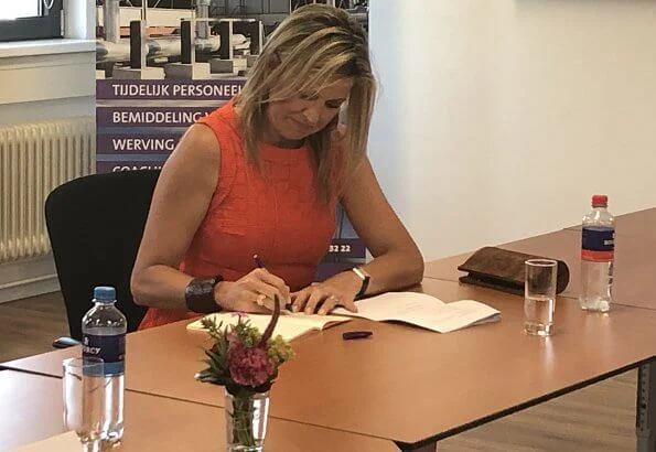 Queen Maxima wore a Natan summer dress in orange. The Queen visited technology facility TechnoHUB in Woerden